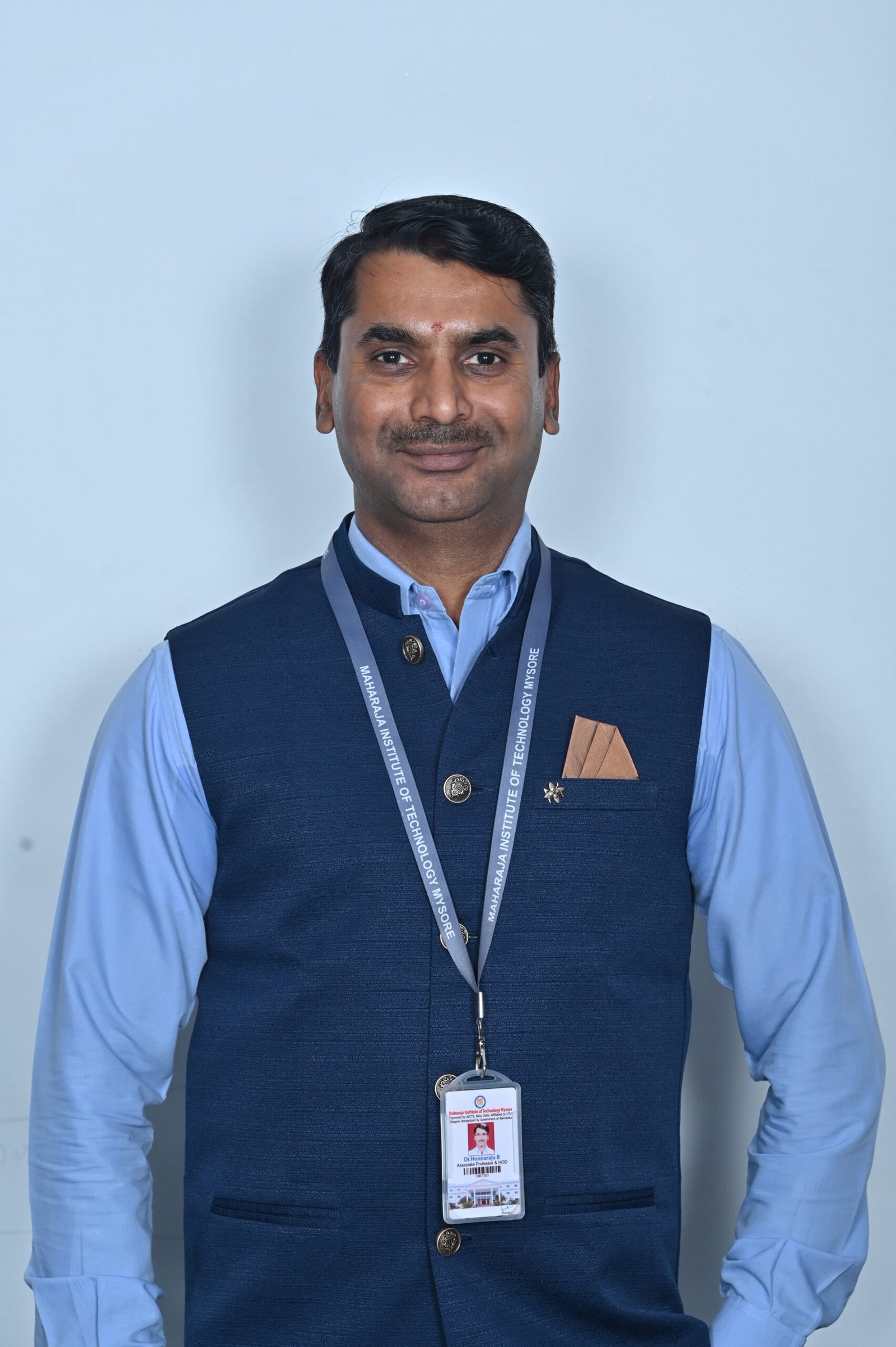Dr. Honnaraju B