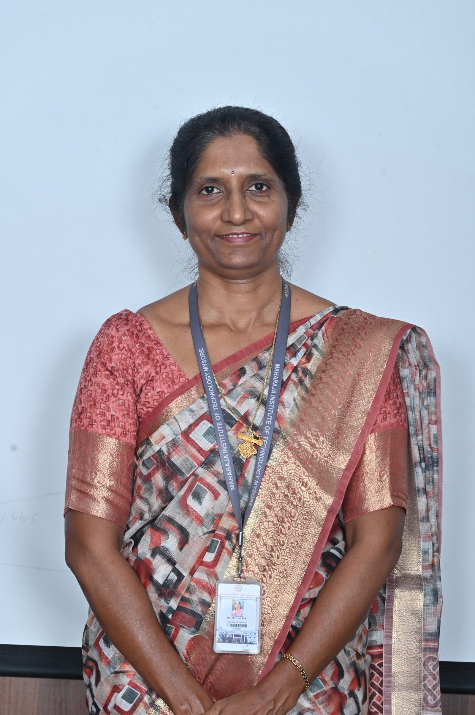 Dr.Thriveni M K